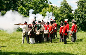 Crown Forces opposing U.S. Forces in a reenactment of part of the Battle of York on Garrison Common, War of 1812 Festival at Fort York National Historic Site, 16 June 2013. Photo: Andrew Stewart.